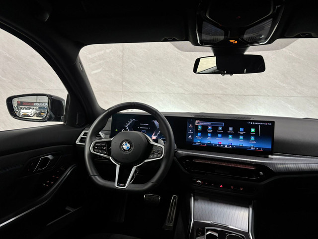 BMW 3 Serie Touring 330i Business Line M Sport Camera foto 13