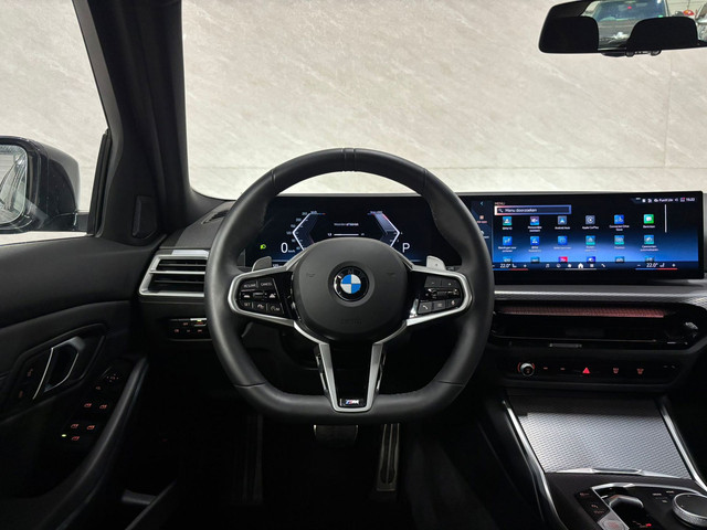 BMW 3 Serie Touring 330i Business Line M Sport Camera foto 14